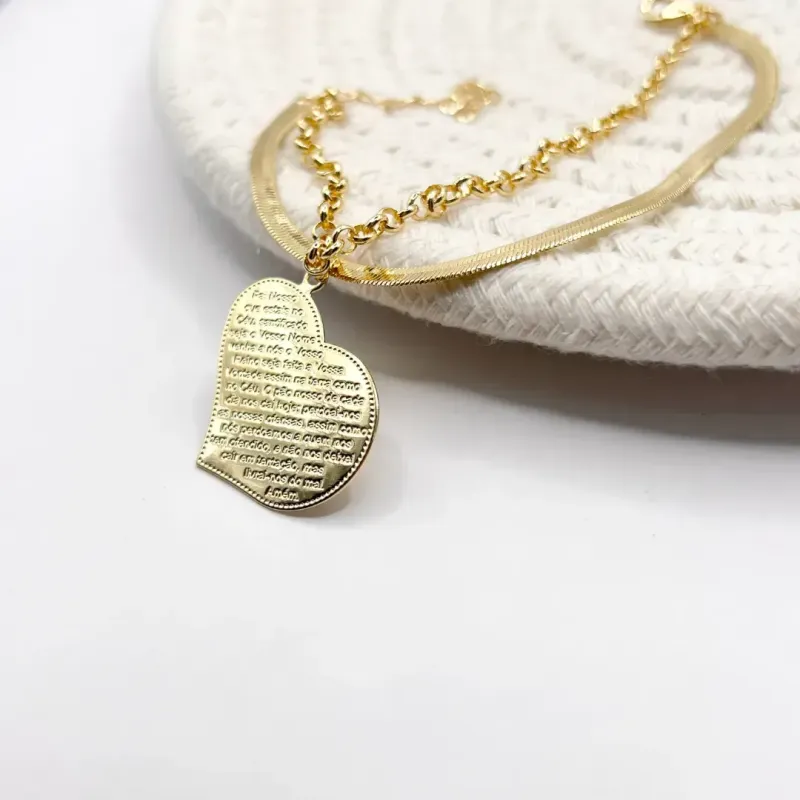 PULSEIRA DUPLA FITA E ELO PORTUGUÊS E PINGENTE DE CORAÇÃO COM ORAÇÃO DO PAI NOSSO PULSEIRA DUPLA FITA E ELO PORTUGUÊS E PINGENTE DE CORAÇÃO COM ORAÇÃO DO PAI NOSSO