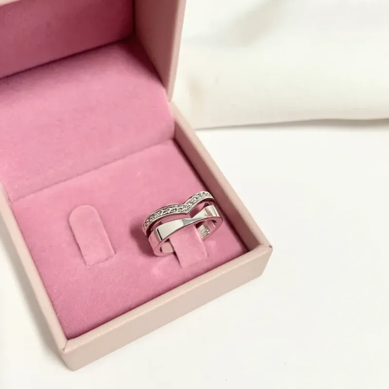 ANEL DUPLO PRATA925 SENDO 1 CRAVEJADO COM BANHO EM RÓDIO BRANCO ANEL DUPLO PRATA925 SENDO 1 CRAVEJADO COM BANHO EM RÓDIO BRANCO