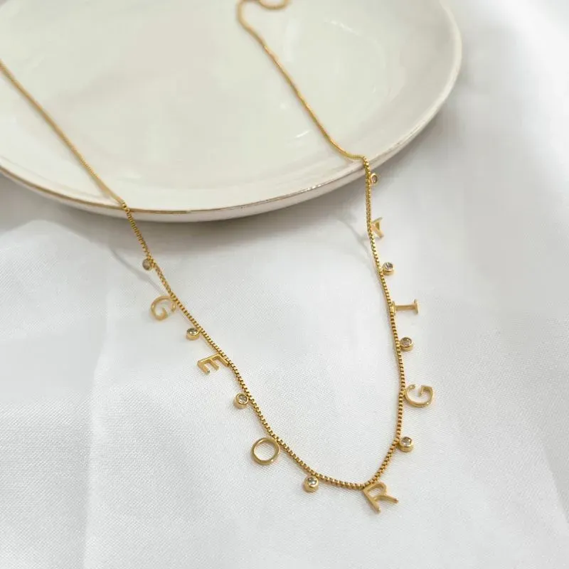 COLAR PERSONALIZADO 7 LETRAS E ZIRCONIAS INTERCALADAS - GEORGIA COLAR PERSONALIZADO 7 LETRAS E ZIRCONIAS INTERCALADAS - GEORGIA