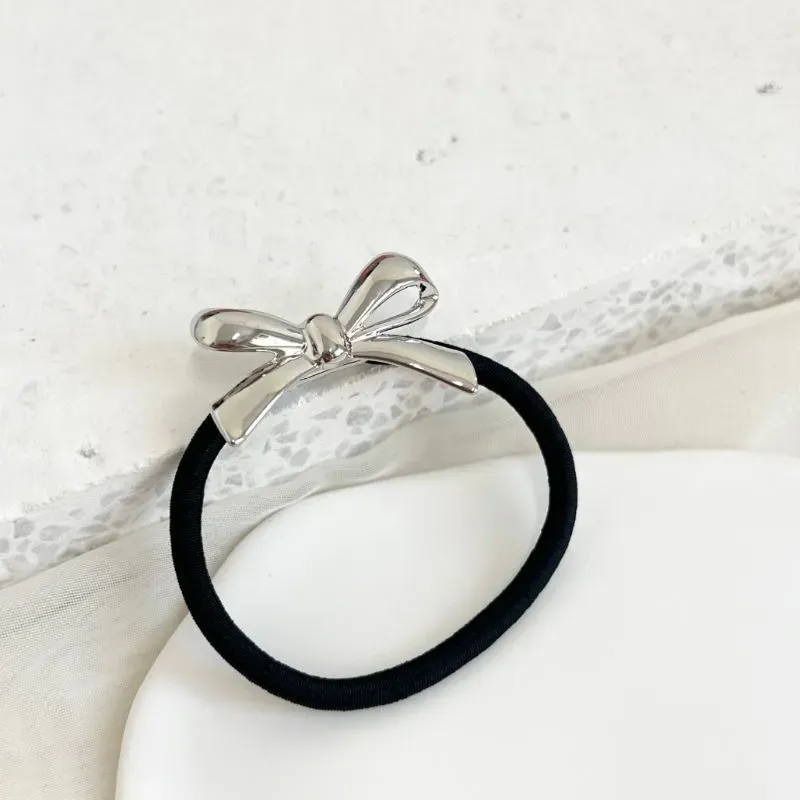 PRESILHA - ELÁSTICO DE CABELO COM LAÇO DE METAL PRESILHA - ELÁSTICO DE CABELO COM LAÇO DE METAL