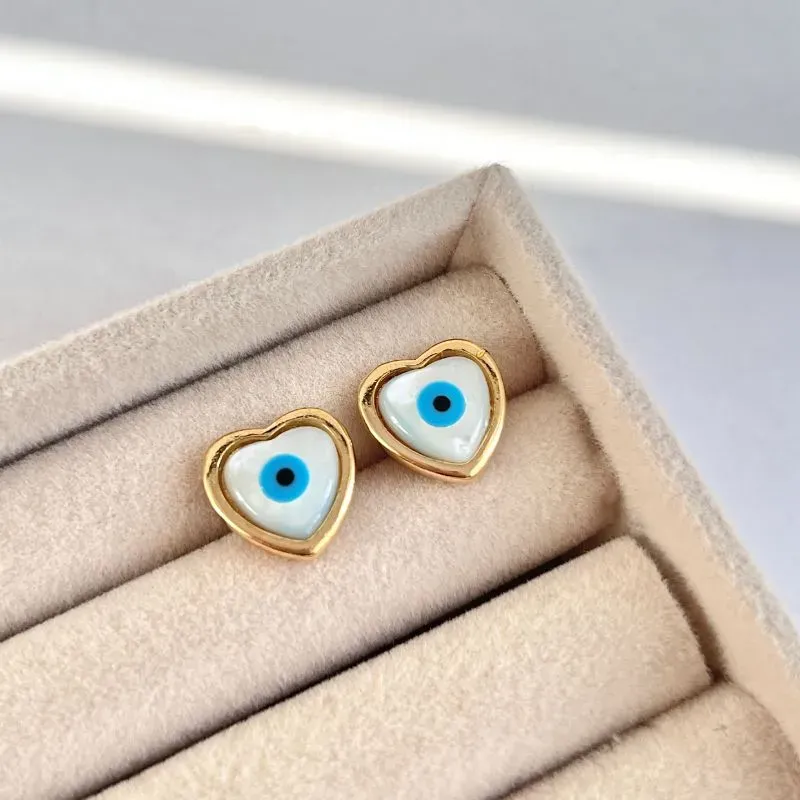 BRINCO CORAÇÃO OLHO GREGO MADRE PÉROLA BRINCO CORAÇÃO OLHO GREGO MADRE PÉROLA