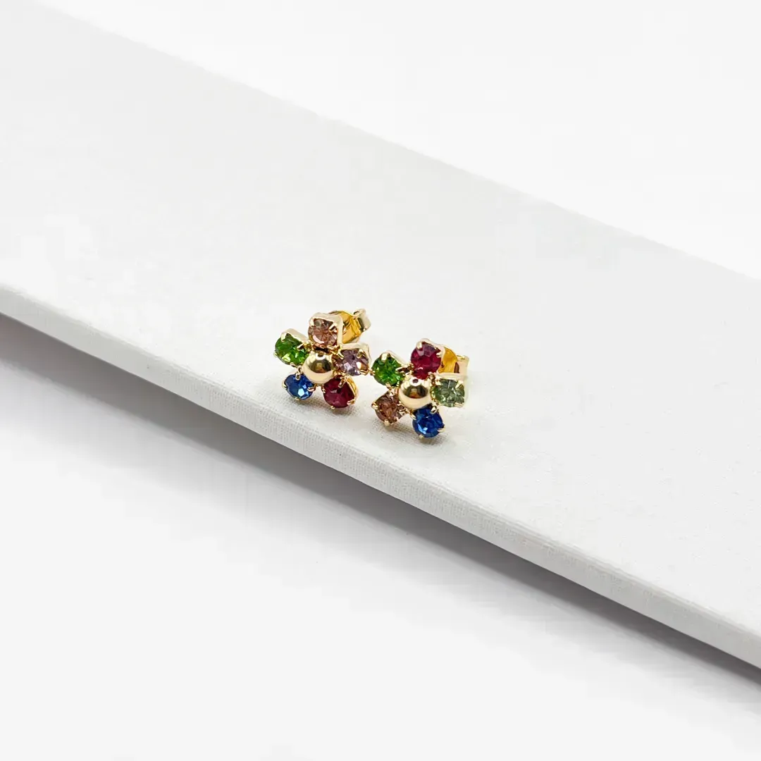 BRINCO FLOR 5 PEDRAS DE STRASS COLORIDAS
