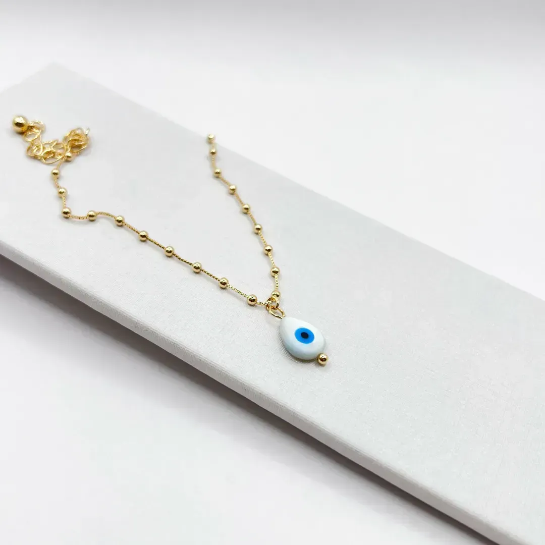 PULSEIRA BOLINHAS E OLHO GREGO FORMATO DE GOTA EM MADRE PÉROLA