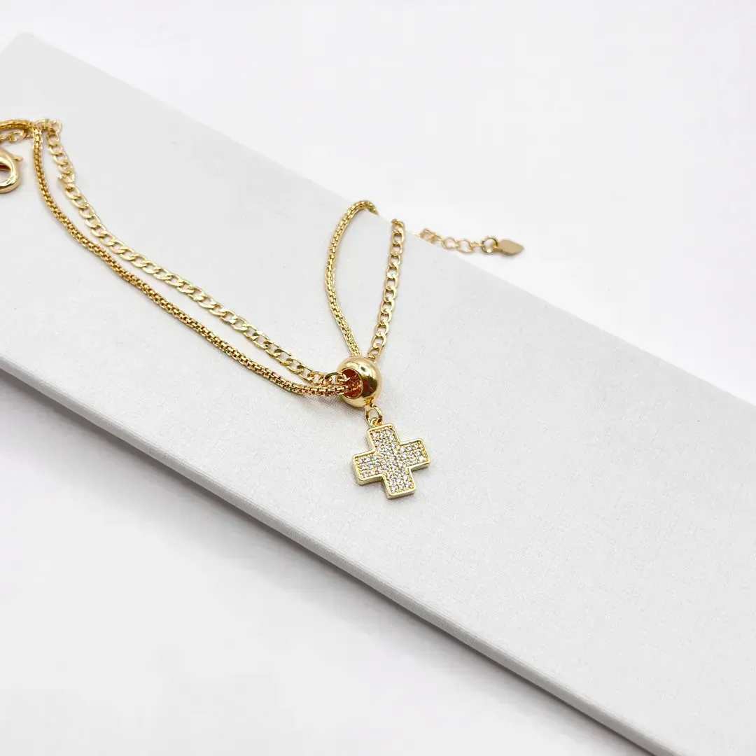 PULSEIRA DUPLA COM BERLOQUE DE CRUZ CRAVEJADA