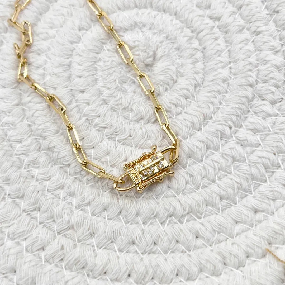 PULSEIRA CARTIER COM FECHO DE SIFRÃO CRAVEJADO