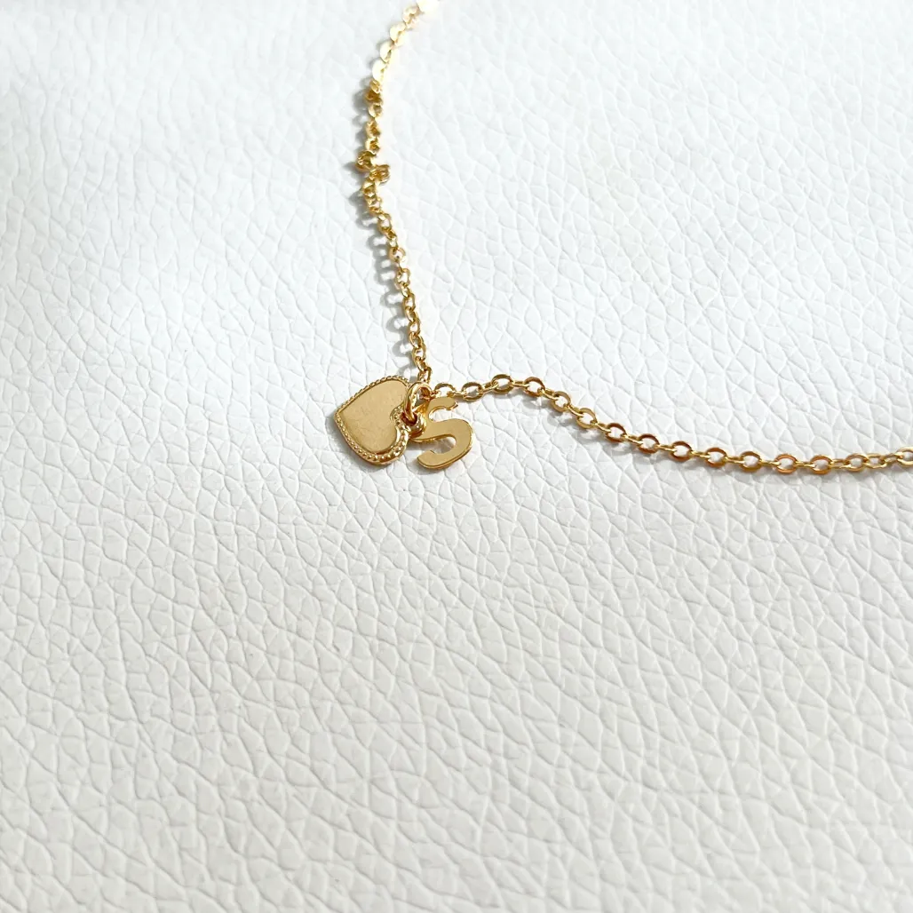 PULSEIRA LETRINHA COM CORAÇÃO CHAPA - S