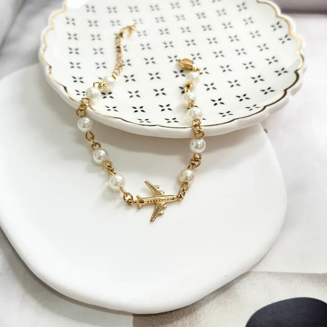 PULSEIRA PÉROLA E AVIÃO