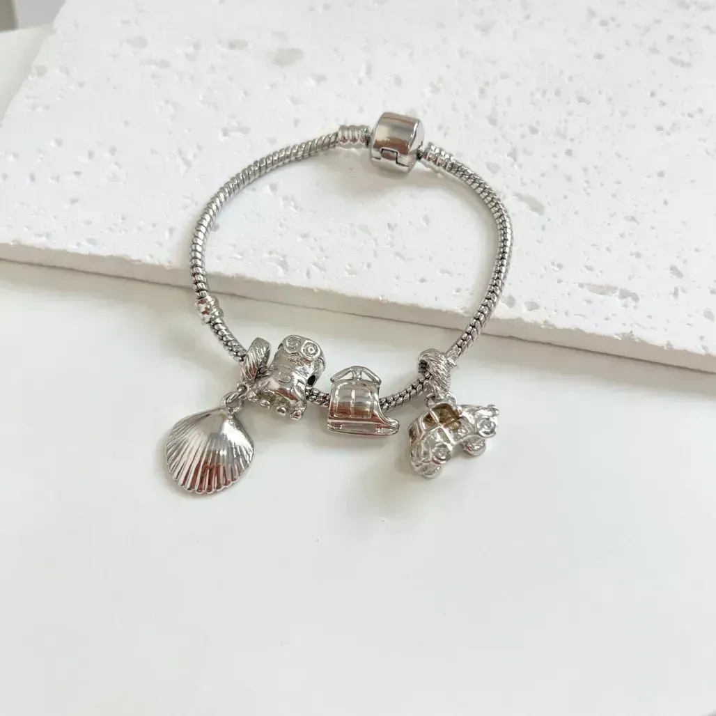 PULSEIRA (INSPIRAÇÃO VIVARA) COM 4 BERLOQUES