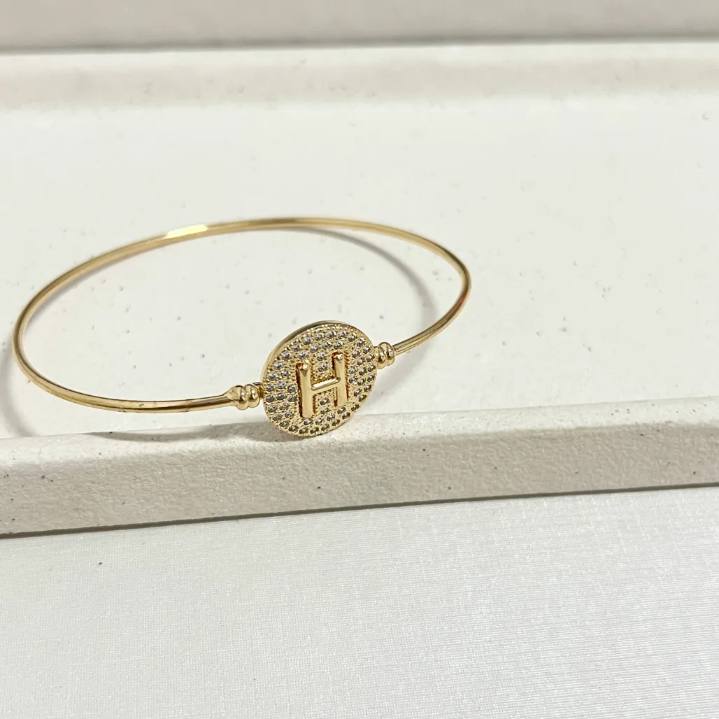 BRACELETE LETRA COM ENCAIXE CRAVEJADO
