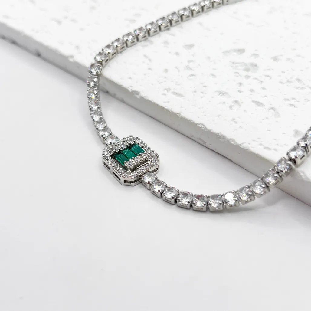 PULSEIRA RIVIERA COM PEDRA BAGUETE VERDE ESMERALDA