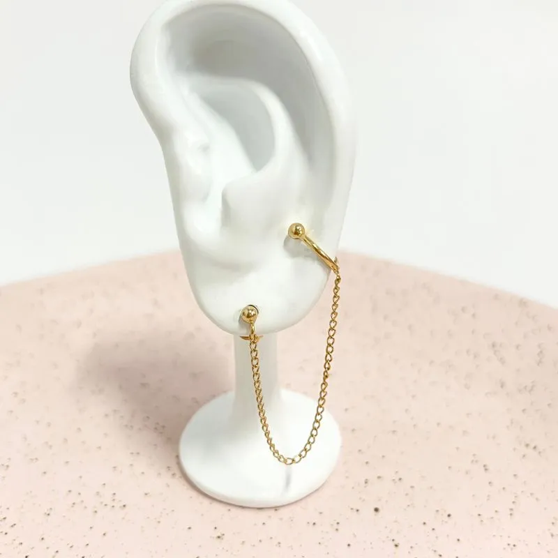 BRINCO BOLINHA COM CORRENTE E PIERCING