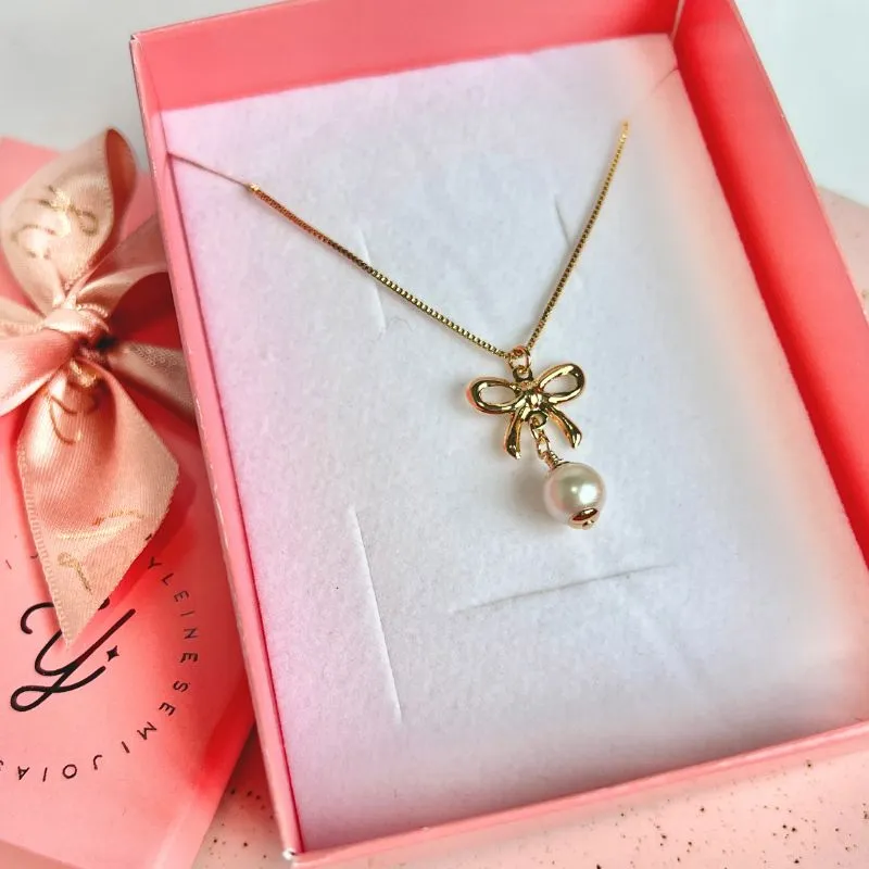 COLAR LAÇO COM PÉROLA PENDURADA COLAR LAÇO COM PÉROLA PENDURADA