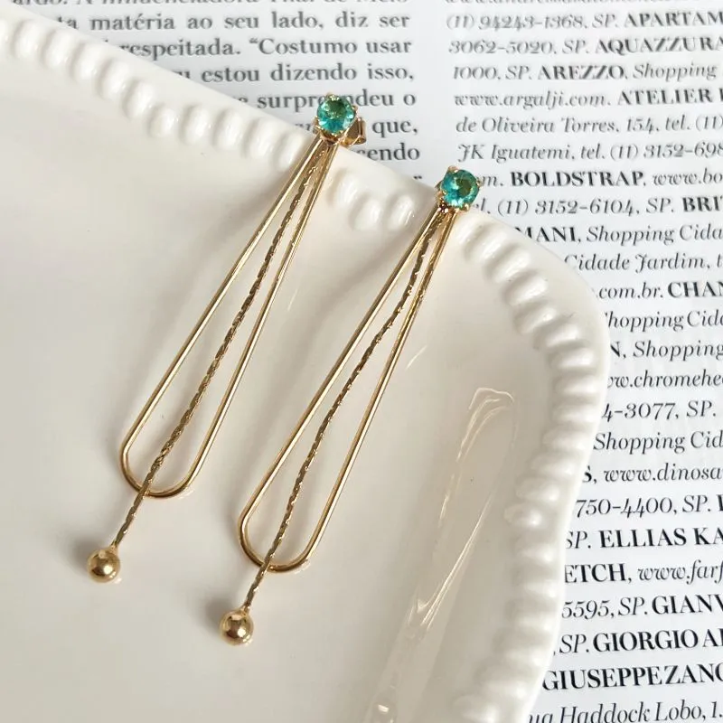 BRINCO PÊNDULO COM PEDRA TURMALINA BRINCO PÊNDULO COM PEDRA TURMALINA