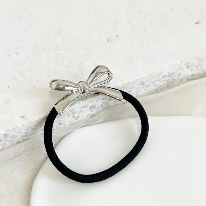 PRESILHA - ELÁSTICO DE CABELO COM LAÇO DE METAL PRESILHA - ELÁSTICO DE CABELO COM LAÇO DE METAL