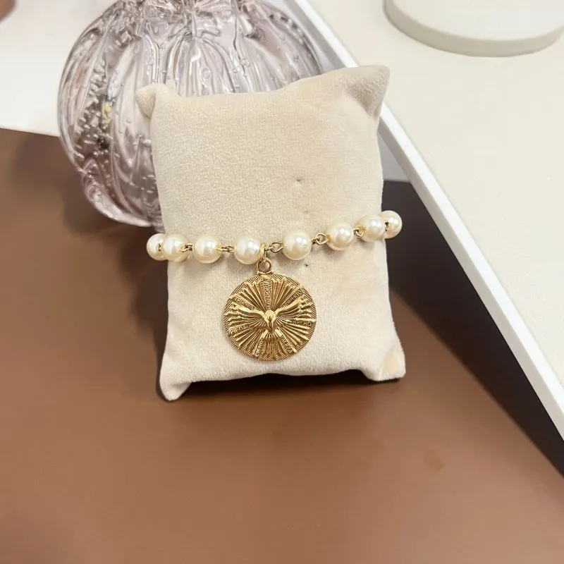 PULSEIRA PÉROLA COM MEDALHA ESPÍRITO SANTO