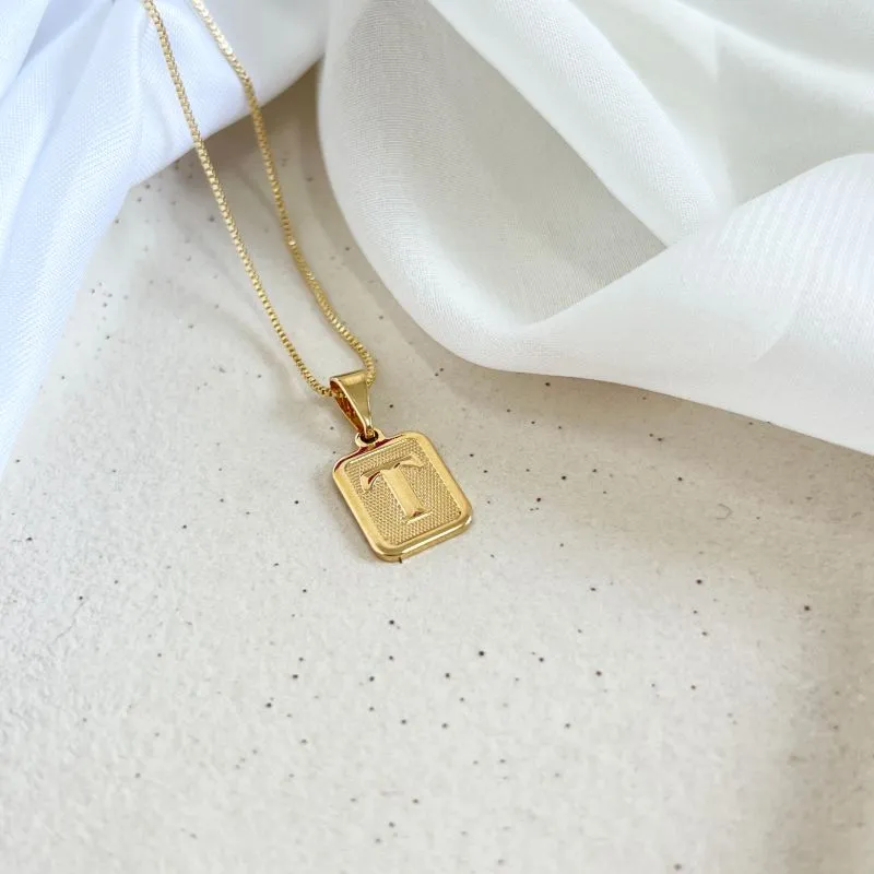 COLAR PINGENTE MINI 1X1 MEDALHA DE LETRA - T COLAR PINGENTE MINI 1X1 MEDALHA DE LETRA - T