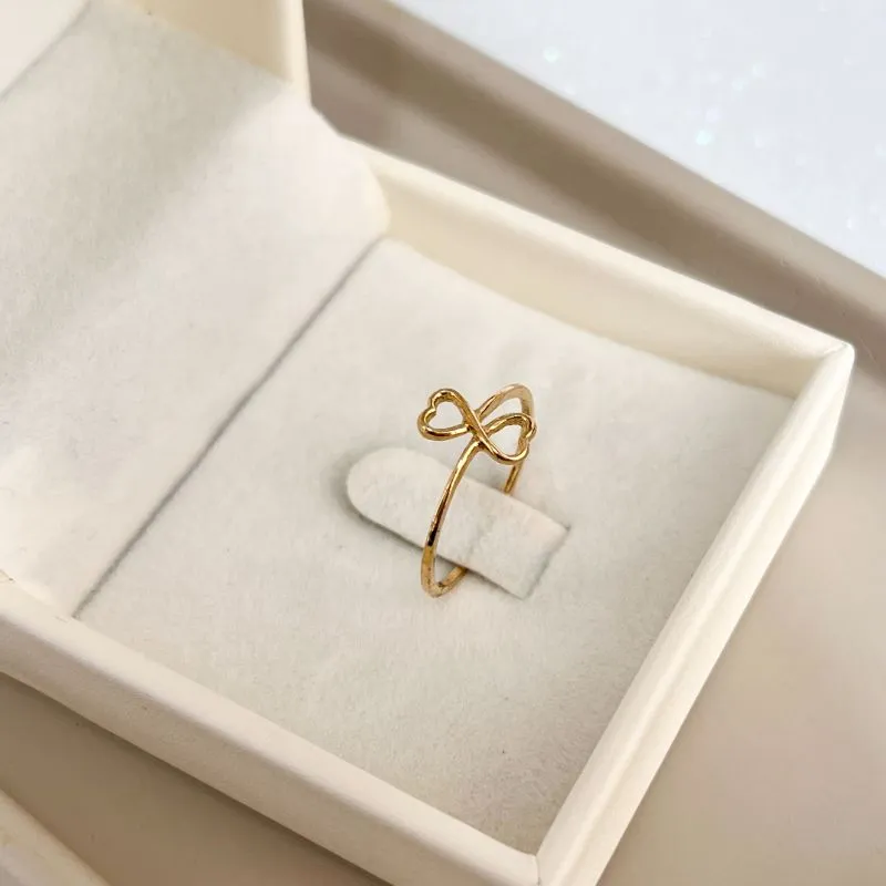 ANEL CORAÇÃO EM FORMATO DE INFINITO ANEL CORAÇÃO EM FORMATO DE INFINITO