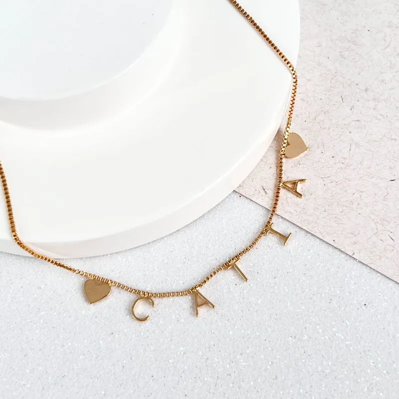 COLAR NOME COM CORAÇÃO NAS PONTAS - CATIA COLAR NOME COM CORAÇÃO NAS PONTAS - CATIA