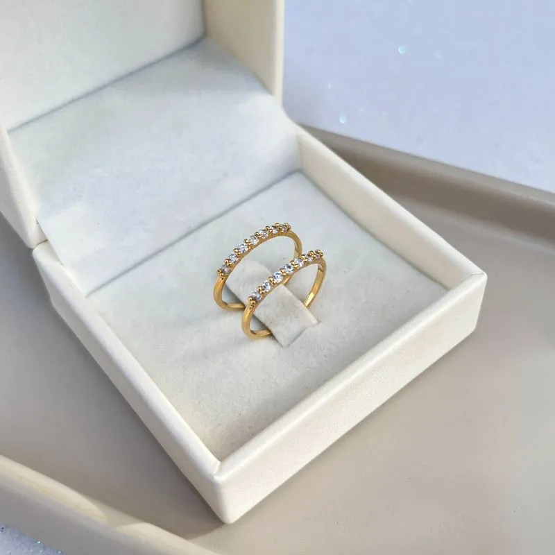 ANEL PAR DE APARADOR DELICADO 7 ZIRCONIAS