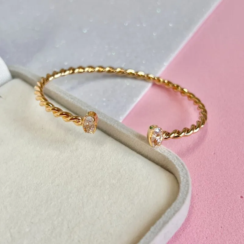 BRACELETE ABERTO FIO ENROLADO 2 ZIRCONIAS OVAL