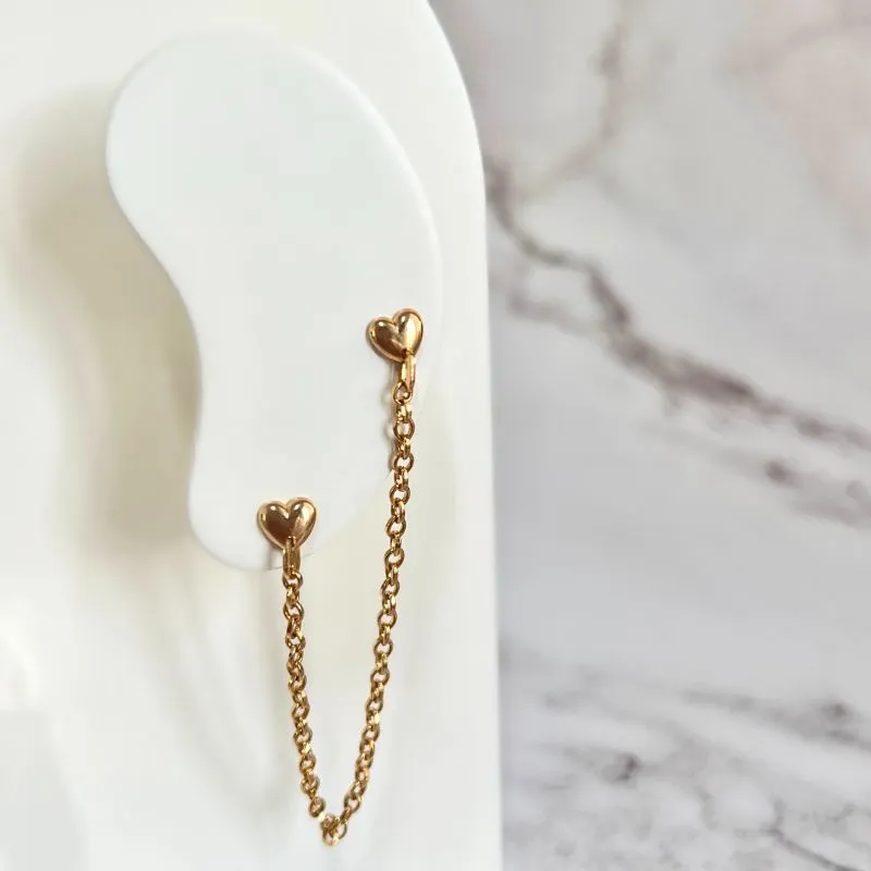 BRINCO EAR LINE CORAÇÃO COM CORRENTE PARA 2 FUROS