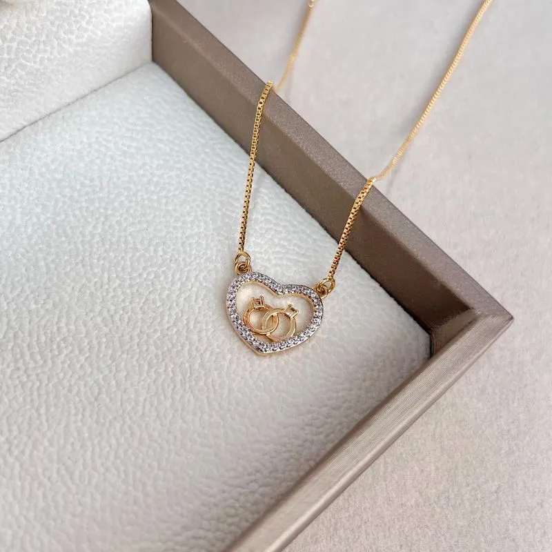 COLAR CORAÇÃO COM 2 SOLITÁRIOS