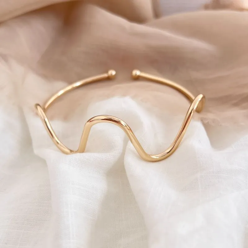 BRACELETE ANTEBRAÇO ONDAS