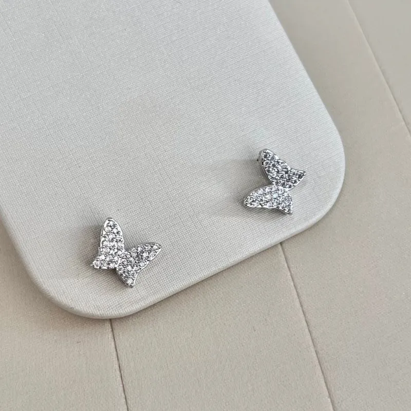 BRINCO BORBOLETA CRAVEJADA