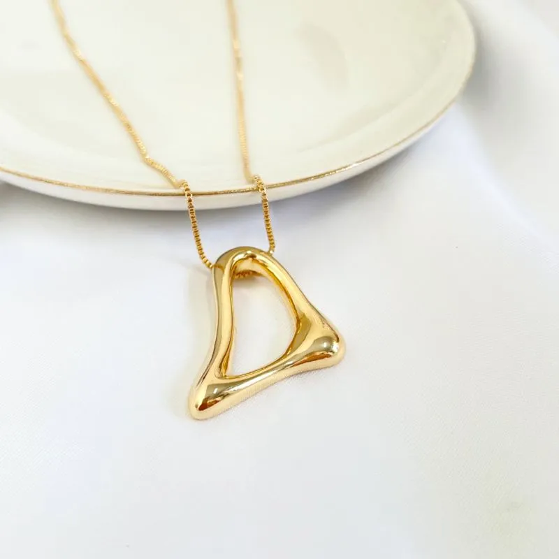 COLAR PINGENTE ORGÂNICO VAZADO 55CM