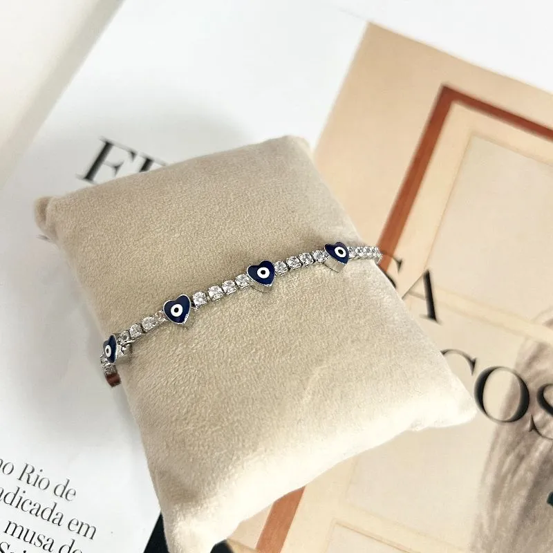 PULSEIRA RIVIERA COM OLHO GREGO DE CORAÇÕES