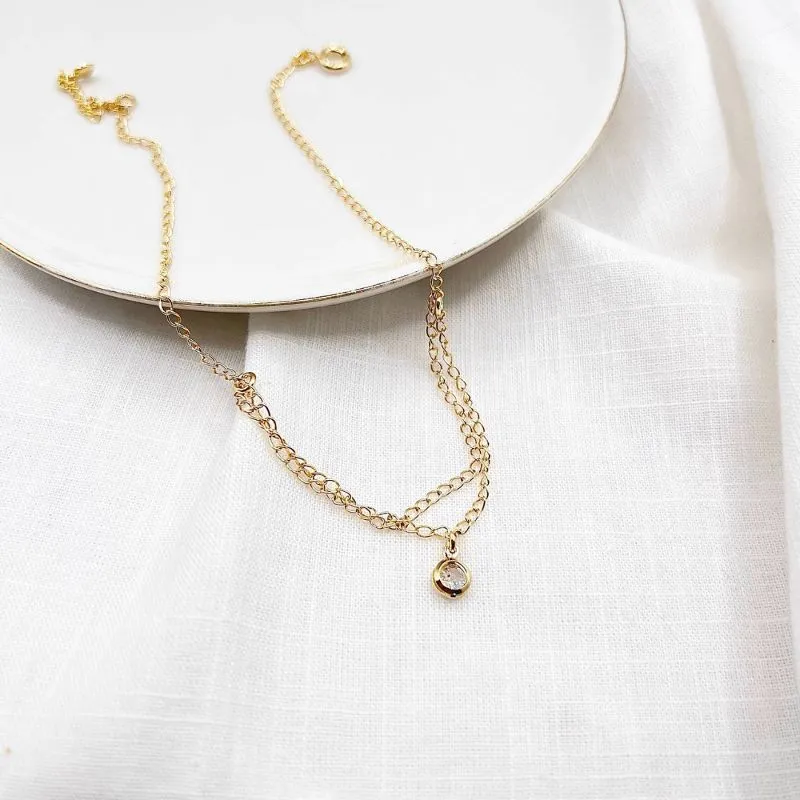 TORNOZELEIRA FIO DUPLO COM PONTO DE LUZ