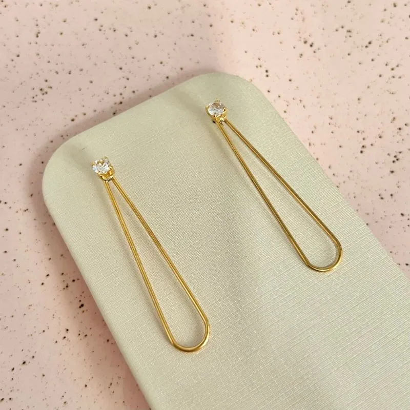 BRINCO PONTO DE LUZ COM VAZADO LONGO