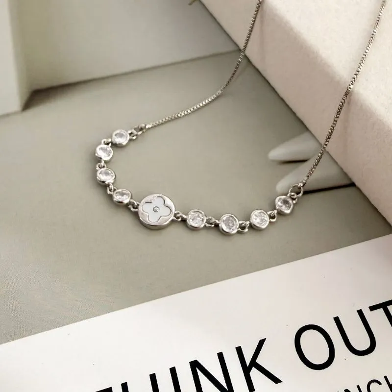 PULSEIRA AJUSTÁVEL TIFANNY E TREVO COM MADRE PÉROLA