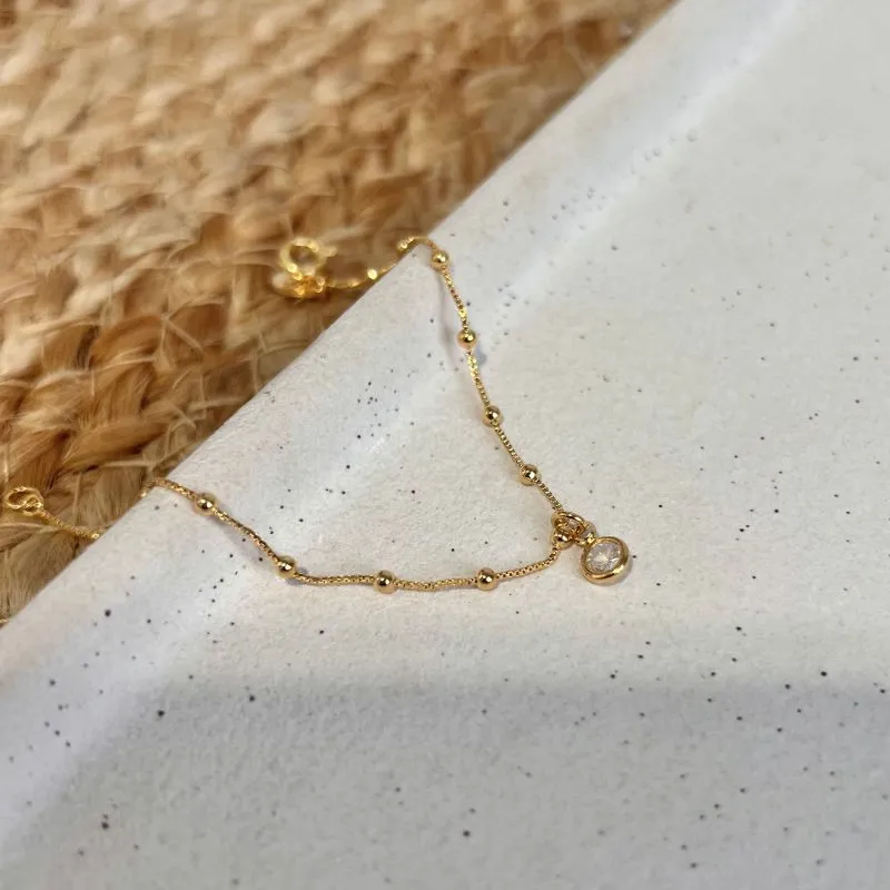 PULSEIRA INFANTIL DE BOLINHAS COM PINGENTE PONTO DE LUZ