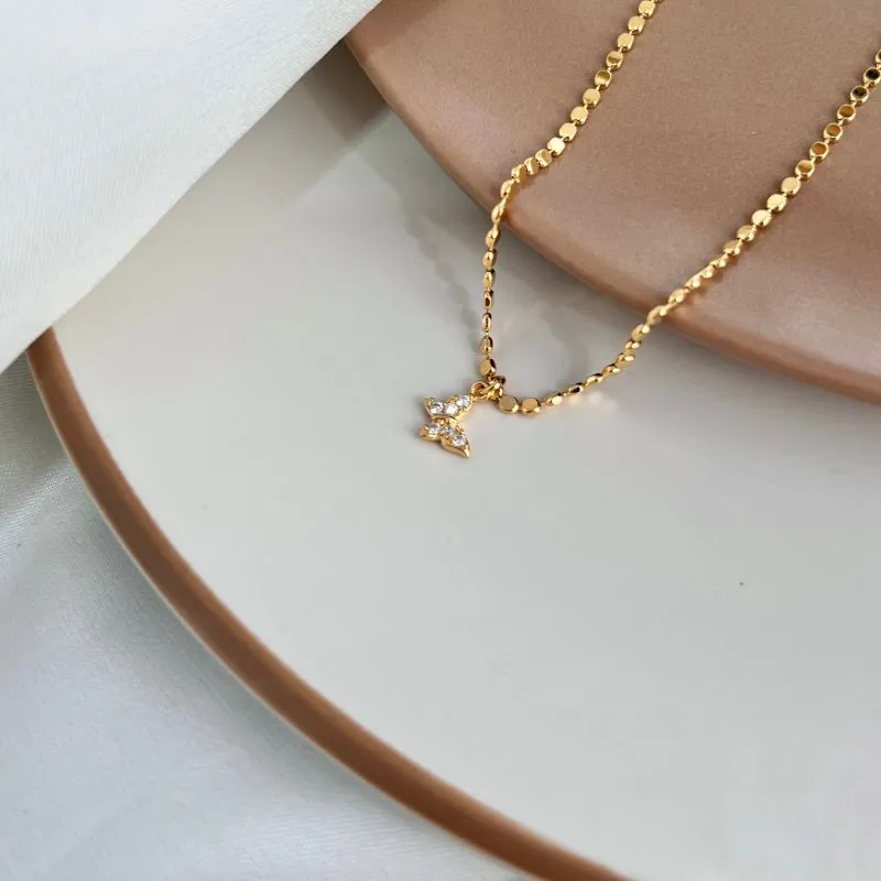 TORNOZELEIRA BOLINHA ACHATADA COM PINGENTE DE BORBOLETA