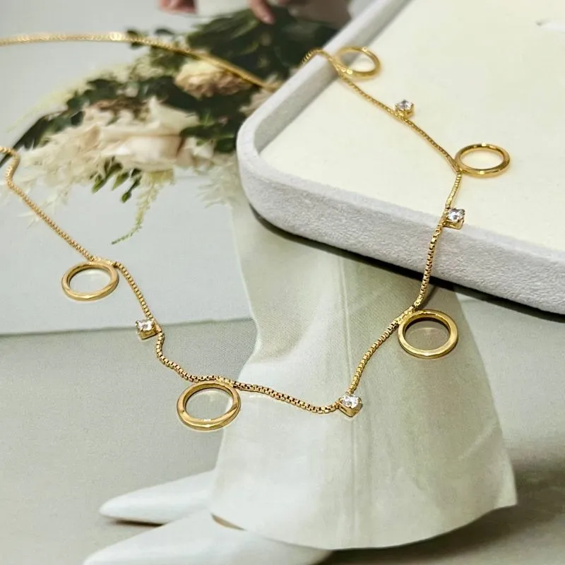 COLAR CHOKER CÍRCULOS E PONTO DE LUZ