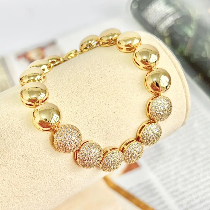 PULSEIRA MEIA ESFERA CRAVEJADA