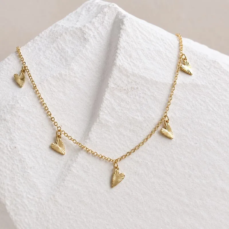 COLAR CHOKER CORAÇÕES RAIADOS 45CM