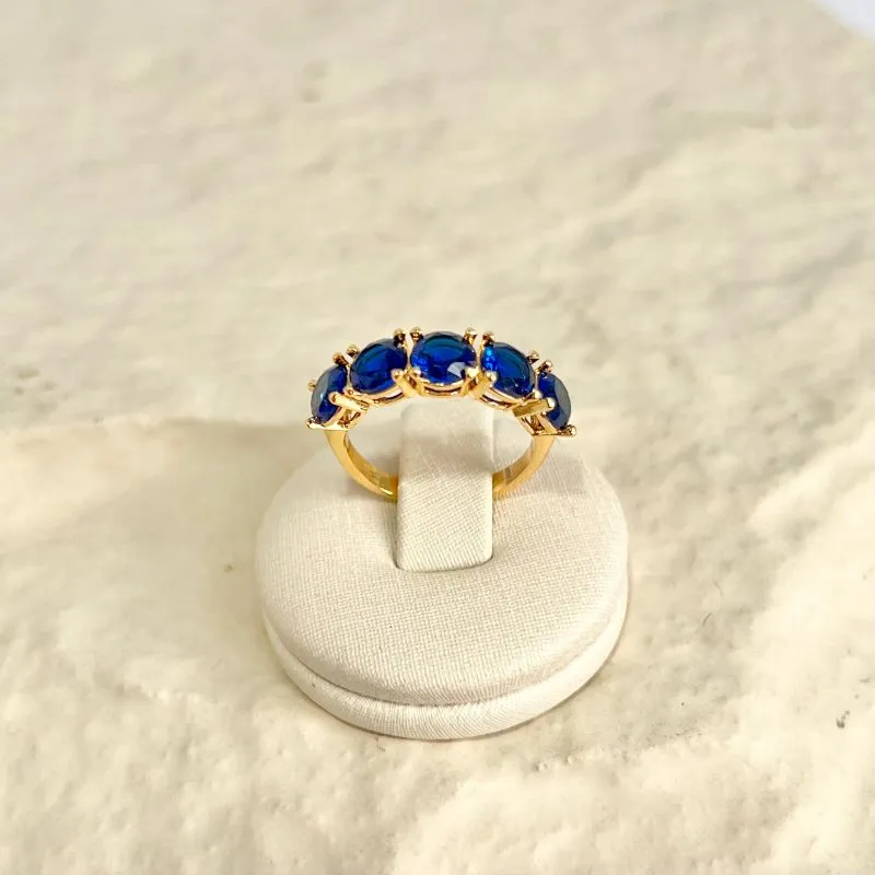 ANEL MEIO APARADOR COM 5 ZIRCONIAS AZUL BIC