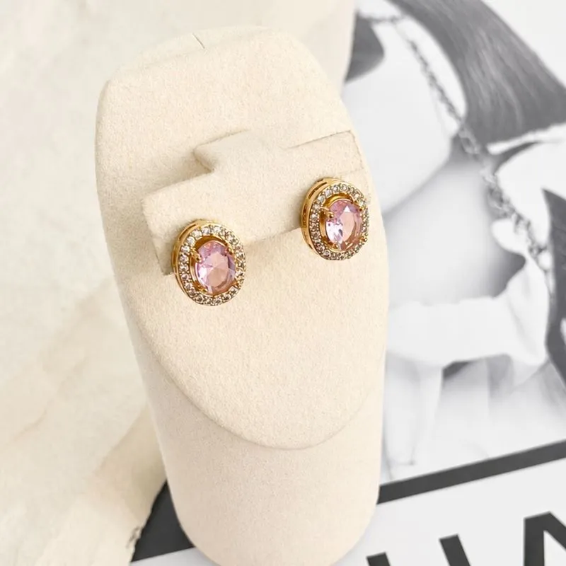 BRINCO OVAL PEDRA ROSA COM MICRO ZIRCONIAS