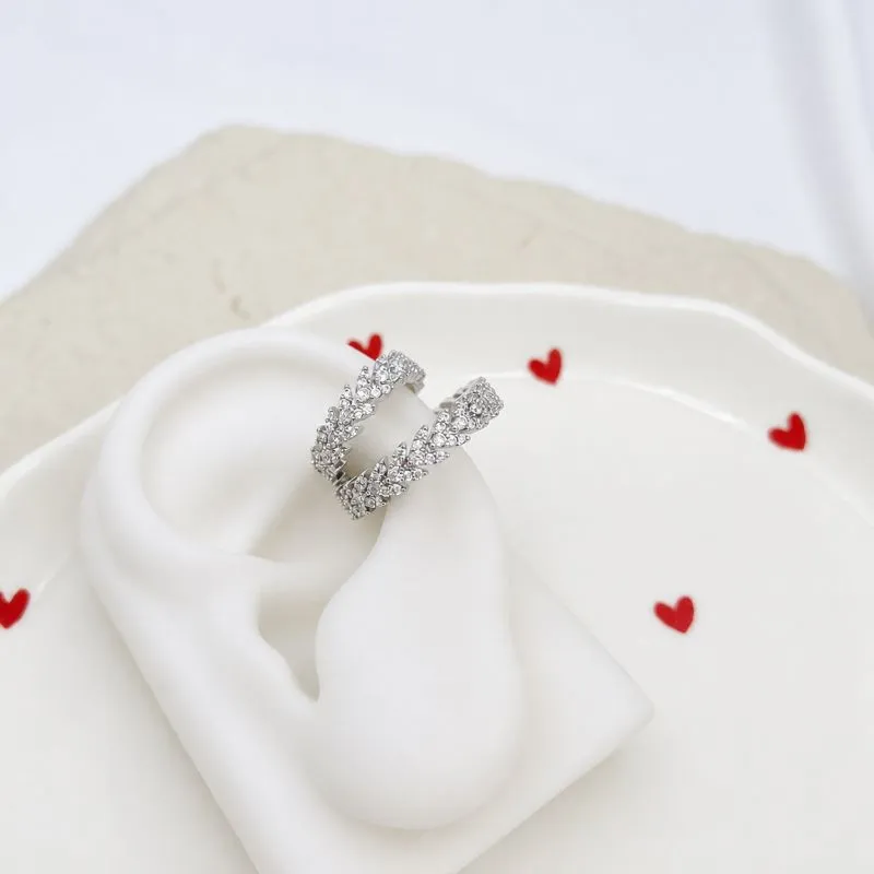 PIERCING DUPLO SETAS COM MICRO ZIRCONIAS