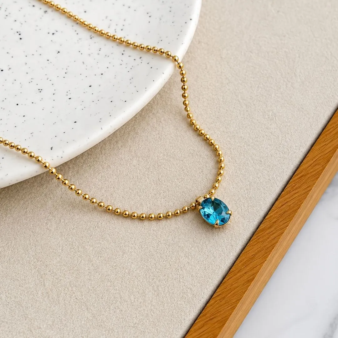 COLAR BOLINHAS COM PINGENTE OVAL AZUL CLARO
