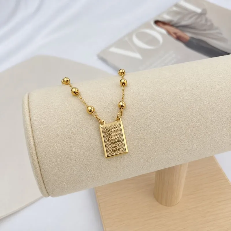 PULSEIRA BOLINHAS COM PLACA ESCAPULÁRIO