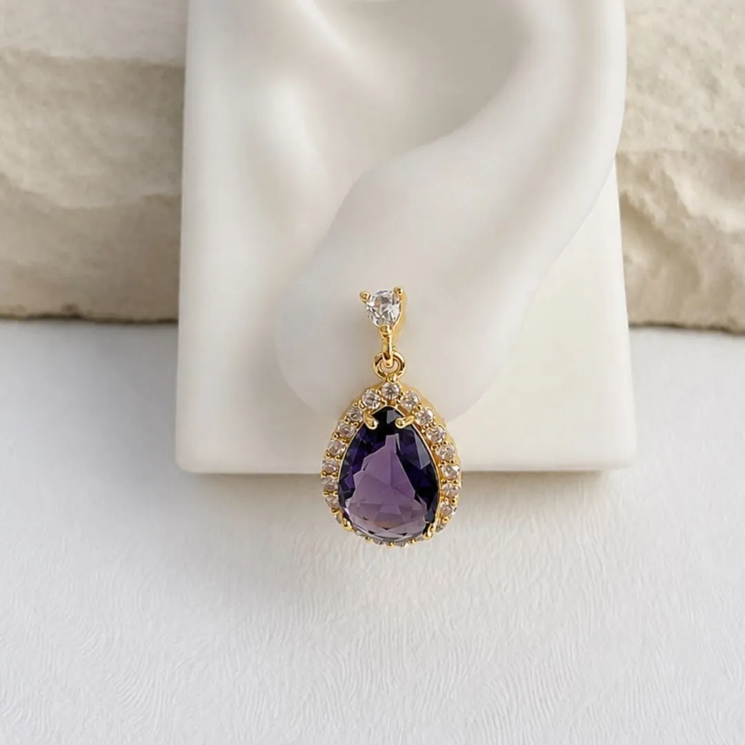BRINCO GOTA PRINCESA DE ZIRCONIAS ROXO PENDURADA