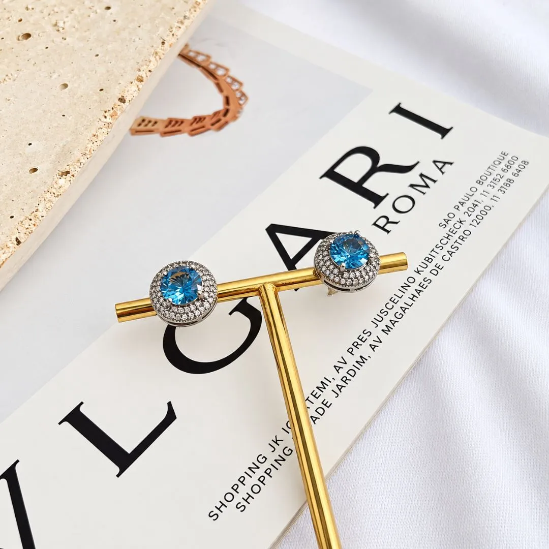 BRINCO ZIRCONIA AZUL REDONDA COM ACABAMENTO EM MICRO ZIRCONIAS